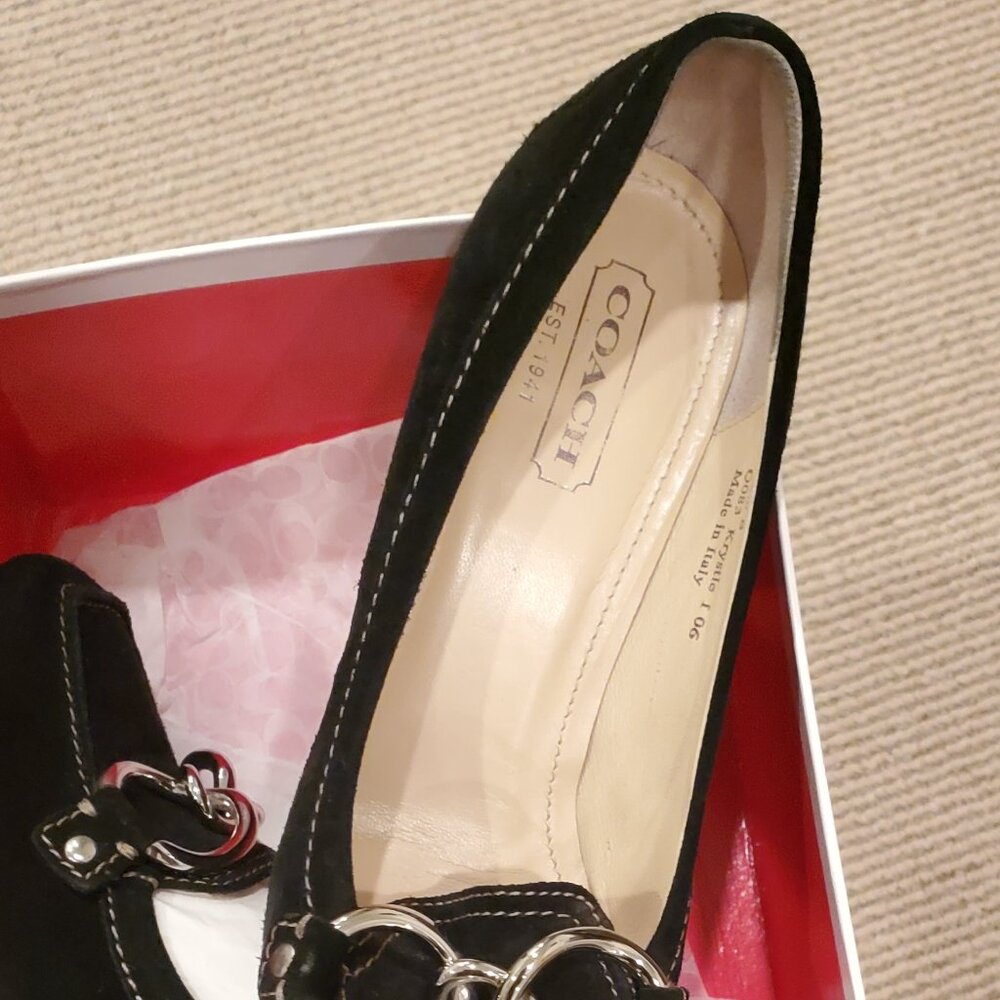 Coach high heeled loafer
